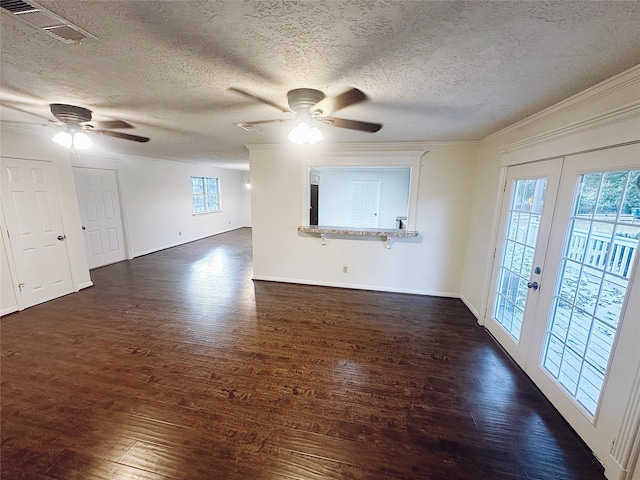 interior space with french doors, dark hardwood / wood-style floors, and plenty of natural light