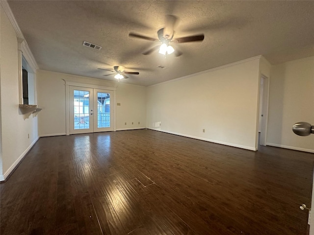 unfurnished living room featuring french doors, ceiling fan, ornamental molding, a textured ceiling, and dark hardwood / wood-style flooring