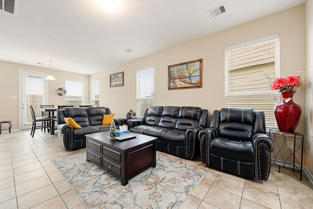 living room featuring light tile patterned floors