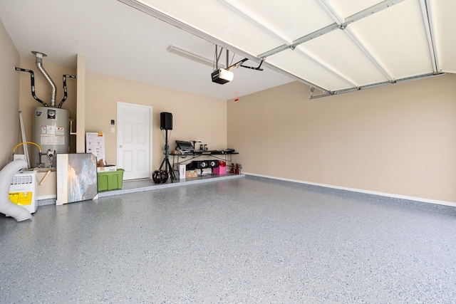 garage featuring water heater and a garage door opener