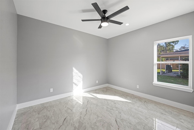 empty room featuring ceiling fan