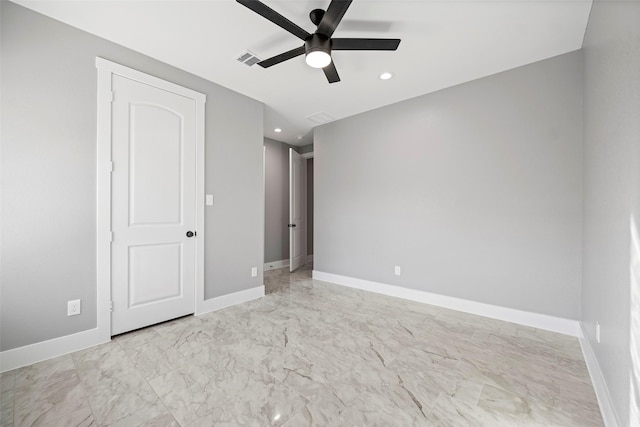 unfurnished room featuring ceiling fan