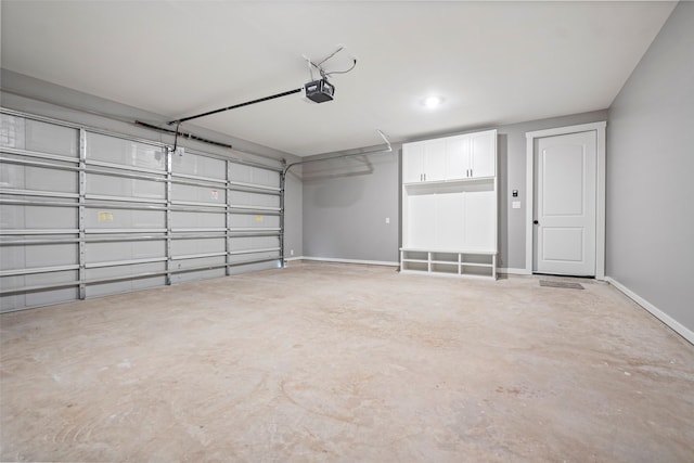 garage featuring a garage door opener