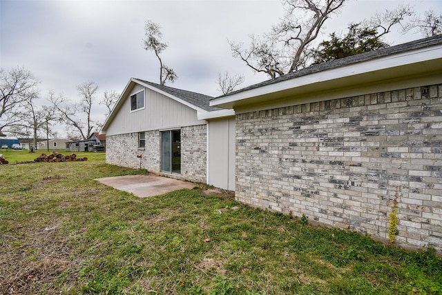 view of property exterior with a yard