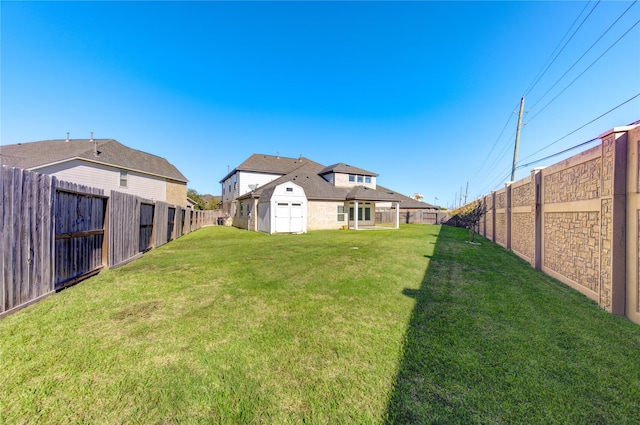 view of yard with a shed