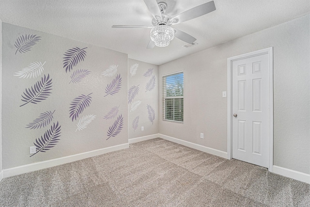 unfurnished room featuring carpet floors and ceiling fan