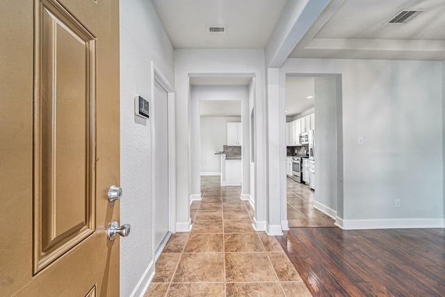 hall featuring light wood-type flooring