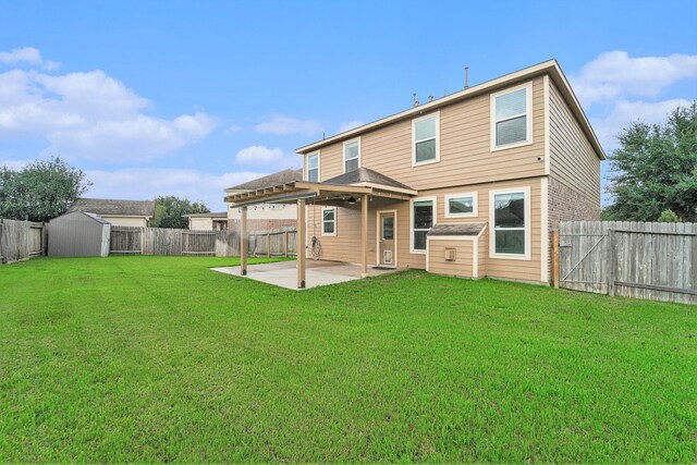 rear view of house featuring a patio area, a lawn, and a storage unit