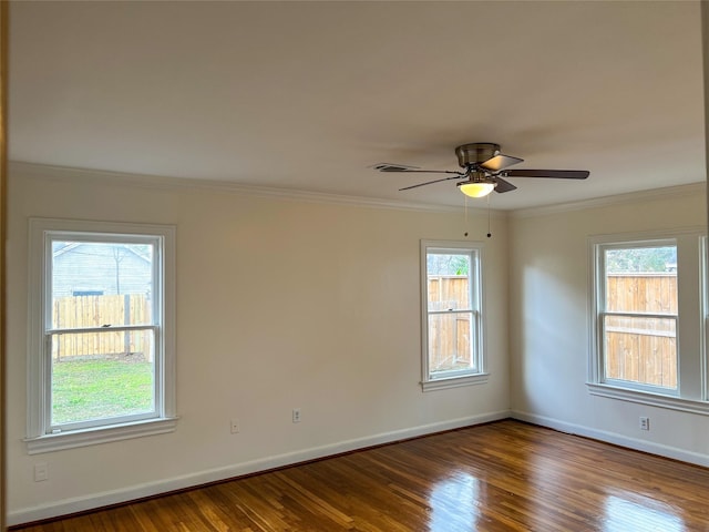 unfurnished room with hardwood / wood-style floors, plenty of natural light, and ceiling fan