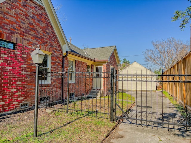 view of side of property with a garage