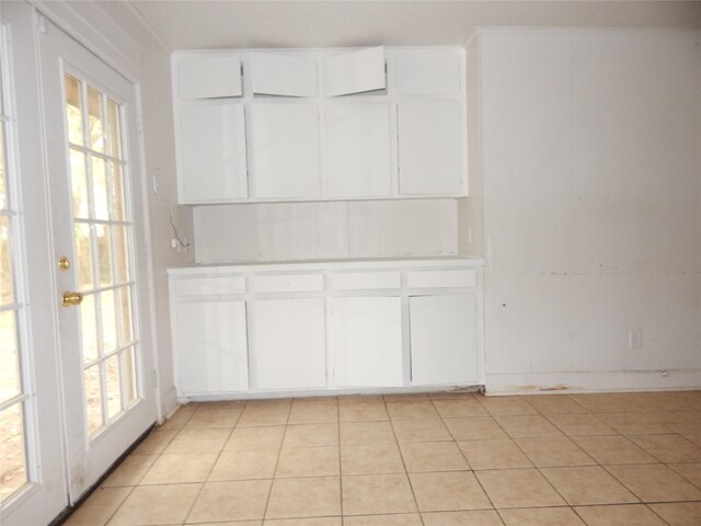 interior space featuring light tile patterned flooring