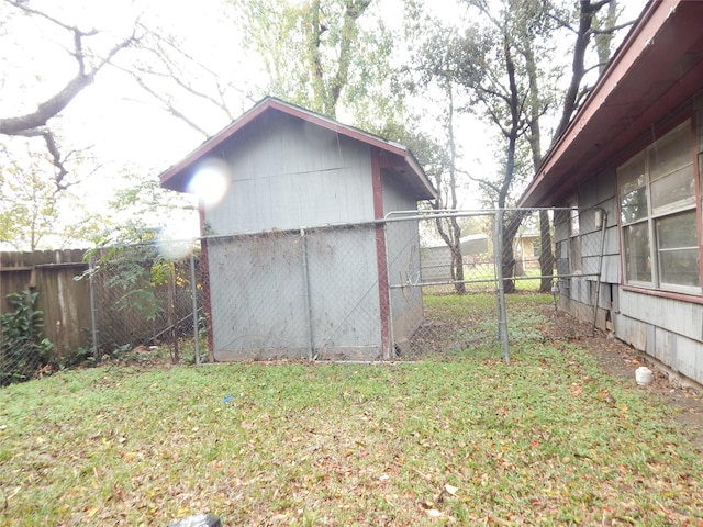 view of outdoor structure with a yard