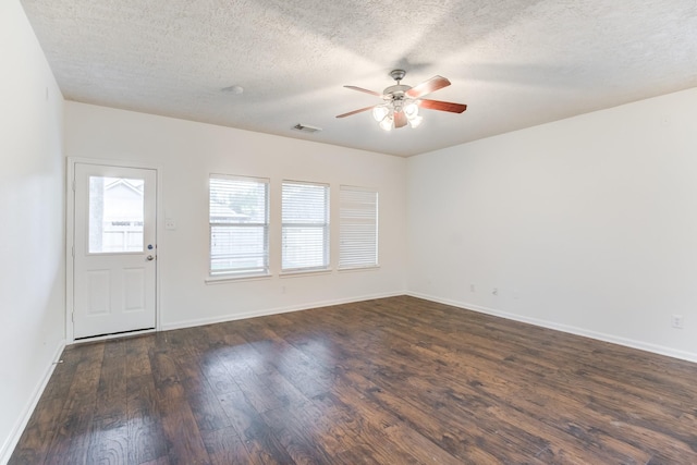 foyer entrance featuring a textured ceiling, dark hardwood / wood-style flooring, and ceiling fan