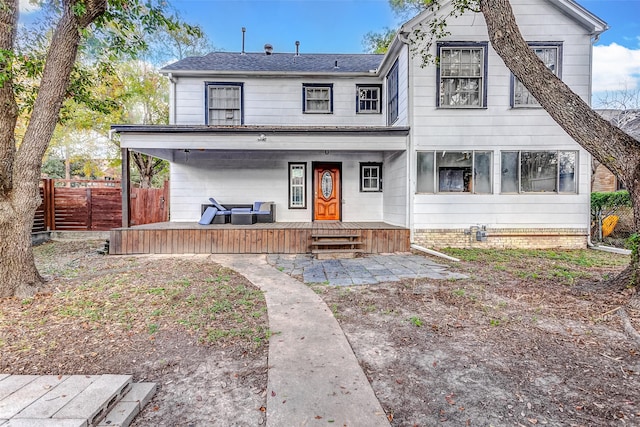 view of front of property with an outdoor living space