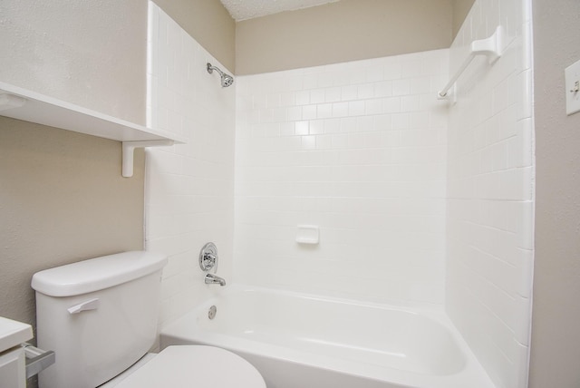 full bathroom featuring vanity, toilet, and tiled shower / bath