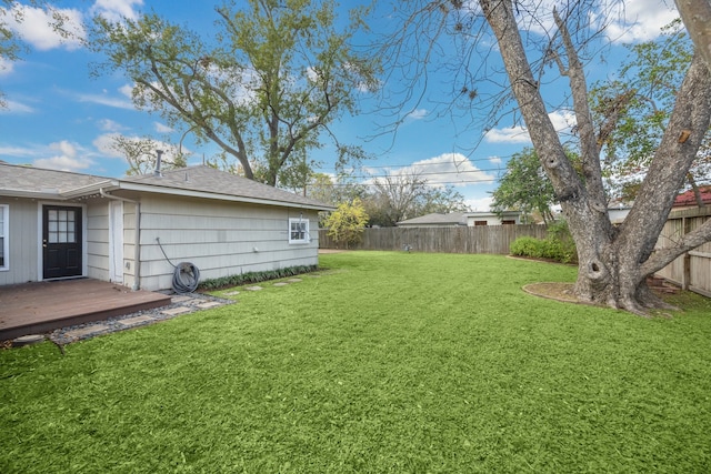 view of yard featuring a wooden deck