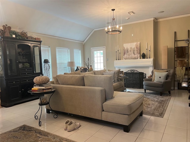 tiled living room featuring a chandelier, vaulted ceiling, and ornamental molding