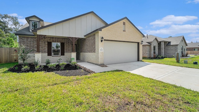 view of front facade with a garage and a front yard