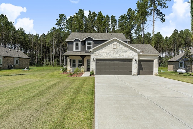 view of front facade featuring a porch, a garage, and a front yard