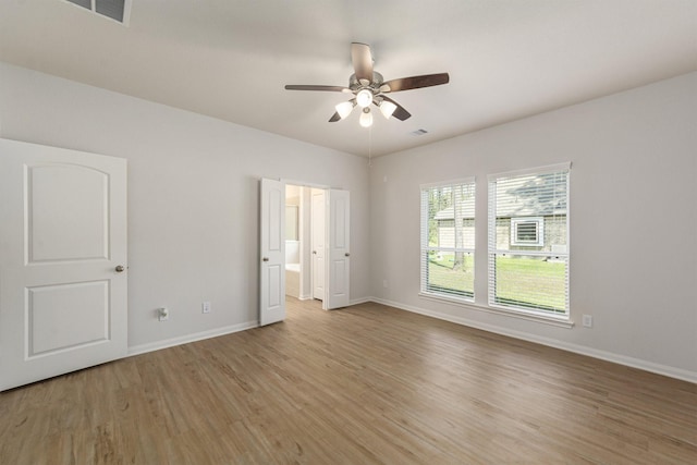 unfurnished bedroom featuring ceiling fan and light hardwood / wood-style floors