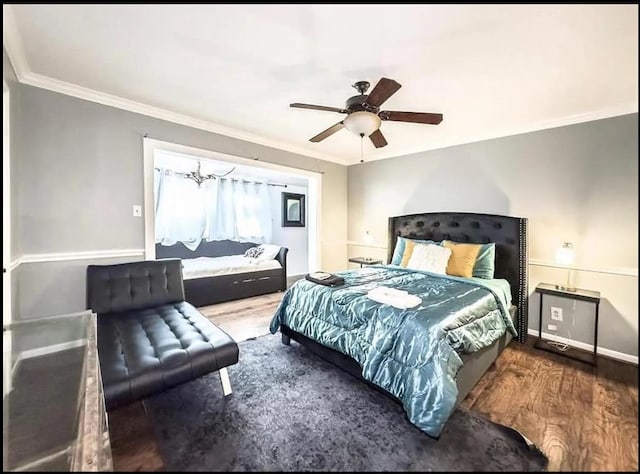 bedroom featuring ceiling fan, wood-type flooring, and ornamental molding