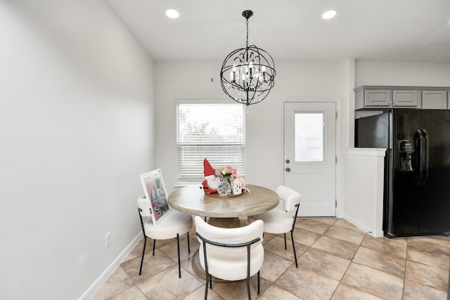 dining area with a chandelier