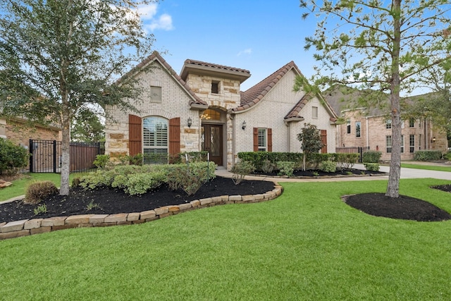 view of front of house with a front lawn