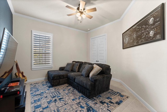 tiled living room with ceiling fan and crown molding