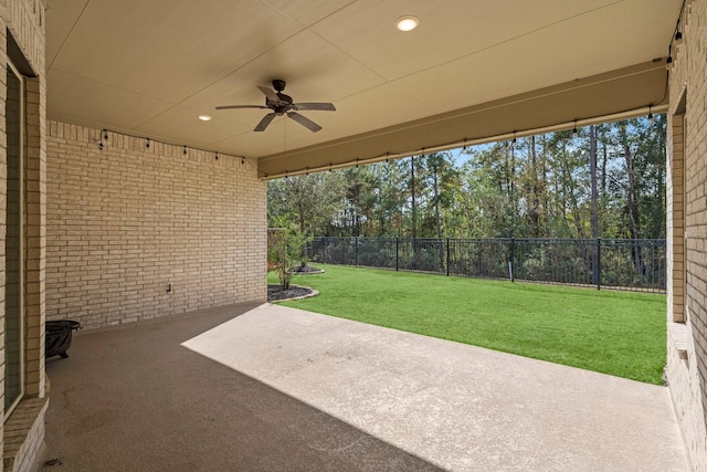 view of patio featuring ceiling fan