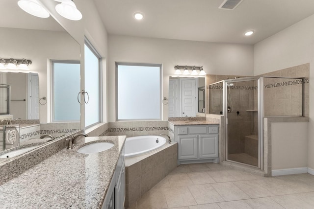 bathroom with separate shower and tub, tile patterned floors, and vanity