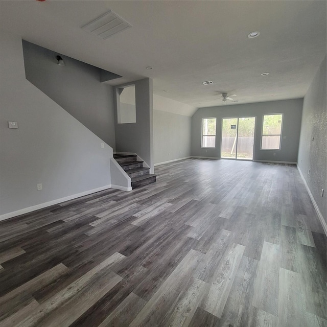 unfurnished living room with hardwood / wood-style floors, ceiling fan, and lofted ceiling