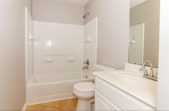 full bathroom featuring tile patterned floors, vanity,  shower combination, and toilet