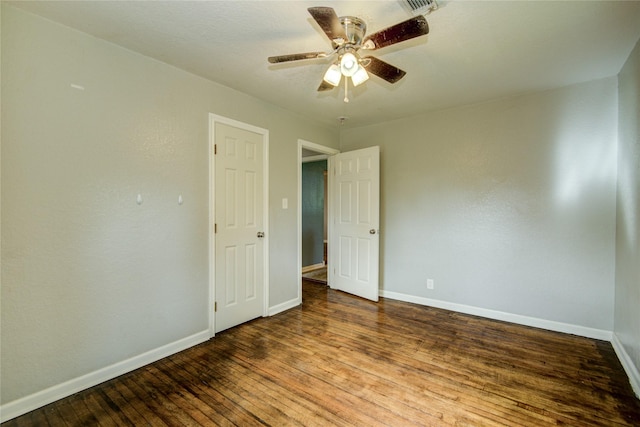 unfurnished room with ceiling fan and hardwood / wood-style floors