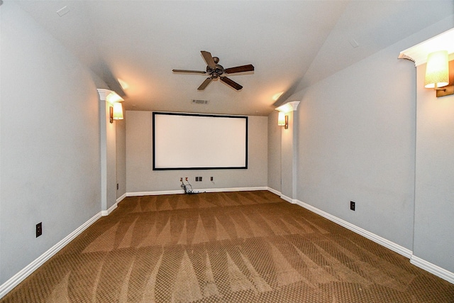 cinema room with carpet and ceiling fan