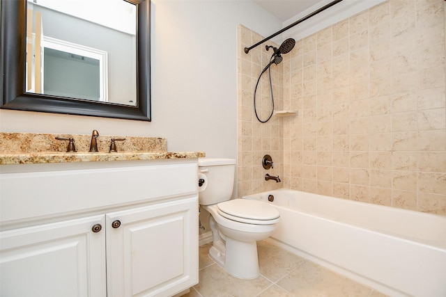 full bathroom with vanity, tiled shower / bath combo, tile patterned floors, and toilet