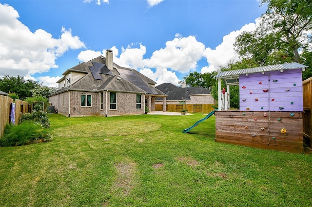 view of yard with a playground