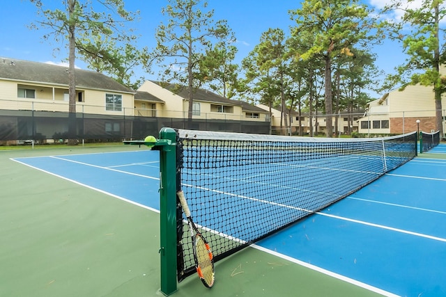 view of tennis court with basketball court