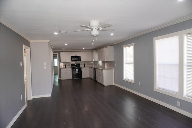 kitchen featuring white cabinetry, dark hardwood / wood-style floors, backsplash, black appliances, and ornamental molding