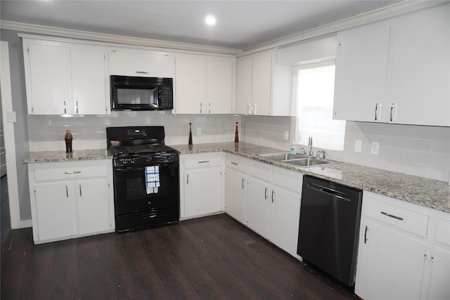 kitchen featuring white cabinets, sink, dark hardwood / wood-style floors, and black appliances