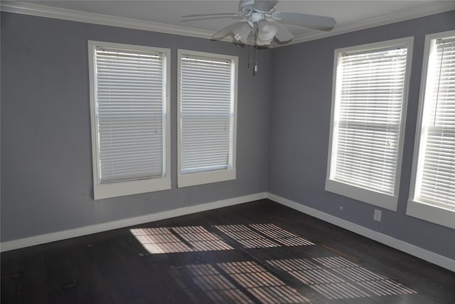 unfurnished room featuring dark hardwood / wood-style floors, ceiling fan, and crown molding