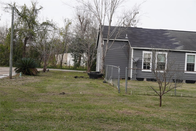 view of property exterior featuring a yard