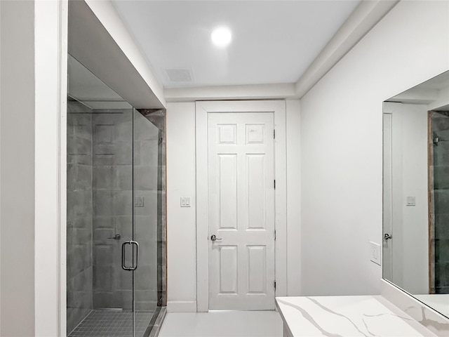 bathroom featuring walk in shower