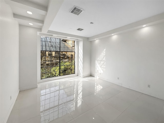 view of tiled spare room