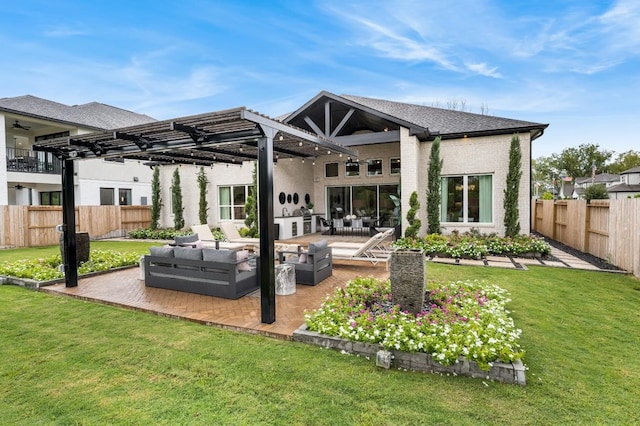 rear view of house featuring a lawn, a pergola, a patio area, and an outdoor hangout area