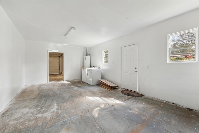 interior space featuring separate washer and dryer and gas water heater