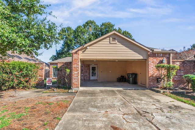 ranch-style home with a carport