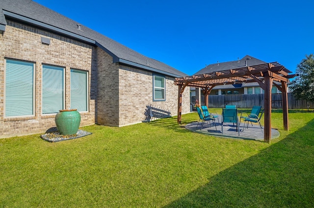 view of yard featuring a pergola and a patio