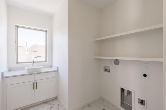 laundry room featuring hookup for an electric dryer, gas dryer hookup, sink, and washer hookup