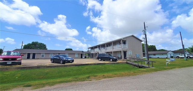 exterior space featuring a front lawn