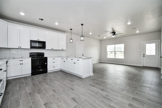 kitchen featuring black appliances, white cabinets, light hardwood / wood-style flooring, ceiling fan, and decorative light fixtures